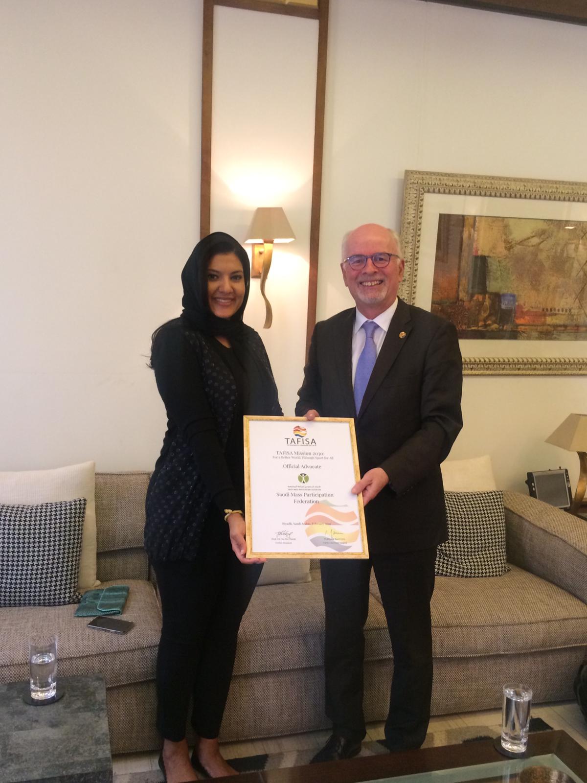 TAFISA Secretary General Wolfgang Baumann presenting outgoing President HRH Princess Reema Bint Bandar Al Saud with an Official Advocate certificate as a mark of her support of TAFISA’s Mission 2030